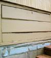 an old-fashioned crawl space door in Newberg about to be replaced