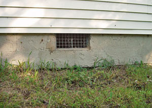 Open crawl space vents that let rodents, termites, and other pests in a home in Longview
