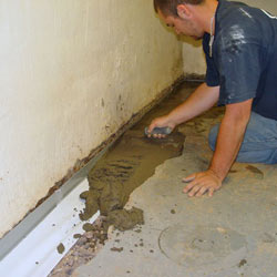Testing a French drain system in a Albany home.