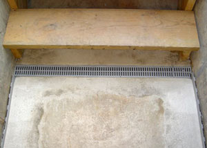Our grated drain system installed on a leaking basement staircase in Camas.
