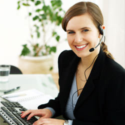 A disaster restoration customer service expert in Beaverton manning the phones