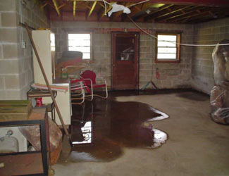 a flooded basement floor in a The Dalles home