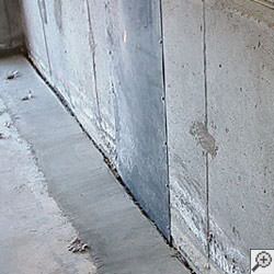 an ugly basement weeping tile drainage system that's clogged and not working in Beaverton.