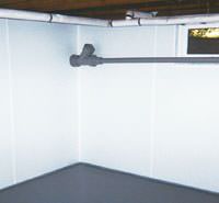 basement vapor barriers on the walls in a formerly leaky basement in Portland, OR
