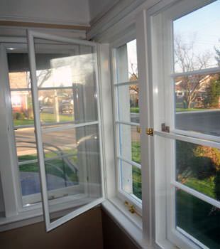 A basement window insulation panel installed on a home in Lebanon