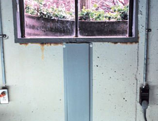 Repaired waterproofed basement window leak in Beaverton