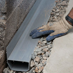 installing a drain tile system in a Tualatin home